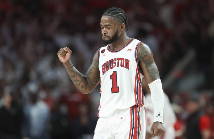 Mar 9, 2024; Houston, Texas, USA; Houston Cougars guard Jamal Shead (1) reacts after a play during the first half against the Kansas Jayhawks at Fertitta Center.